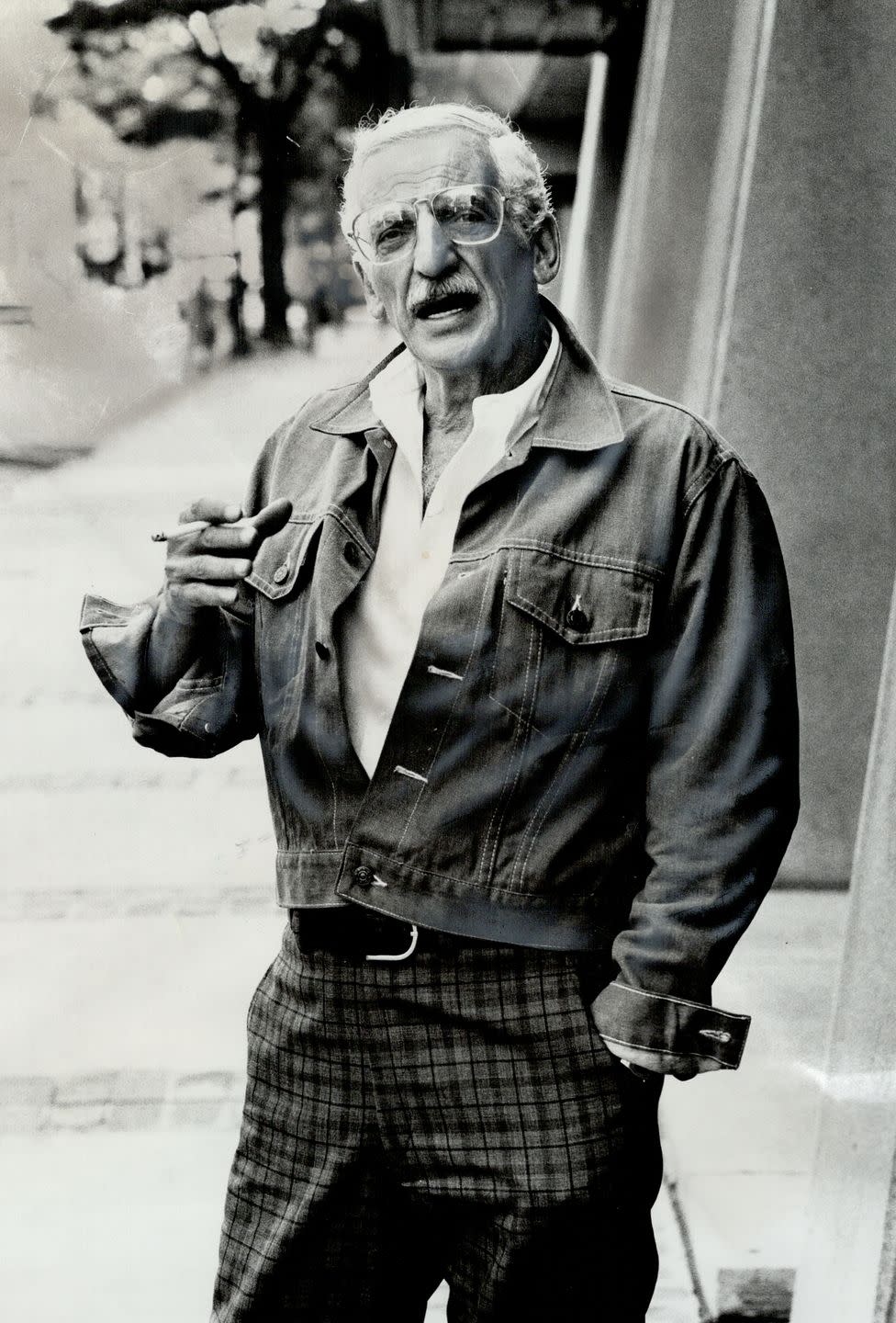 amityville horror author jay anson smoking a cigarette