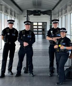 Echo: Thurrock Police officers with the knife arch at Chafford Hundred Lakeside rail station. Credit: Essex Police