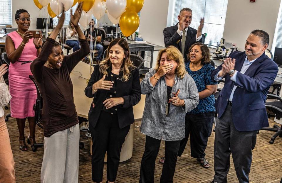 Members of the Miami Herald editorial board including ( center left to right) Nancy Ancrum, editorial page editor, Amy Driscoll deputy editorial page editor and Luisa Yanez editorial page writer, react after winning the he Pulitzer for editorial writing 2023, also in the picture Monica Richardson · VP of Local News at McClatchy , Alex Mena, Interim Executive Editor at Miami Herald / el Nuevo Herald and Dana Banker, managing editor during, on Monday May 08 , 2023.