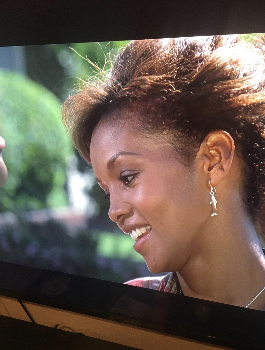 Will Smith's fiancée wearing dolphin earrings