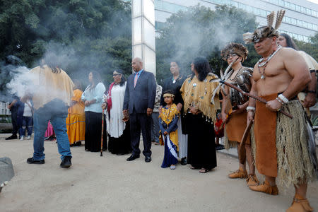 The inaugural "Indigenous People's Day" begins with a sunrise celebration in downtown Los Angeles after the Los Angeles City Council voted to establish the second Monday in October as "Indigenous People's Day", replacing Columbus Day, in Los Angeles, California, U.S., October 8, 2018. REUTERS/Mike Blake