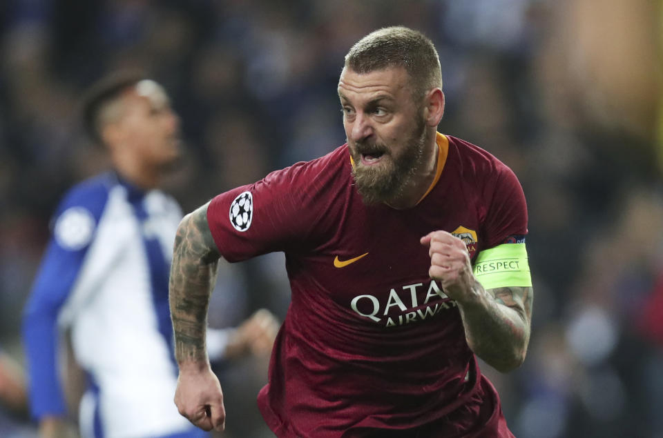 FILE - Roma midfielder Daniele De Rossi celebrates after scoring his side's first goal during the Champions League round of 16, 2nd leg, soccer match between FC Porto and AS Roma at the Dragao stadium in Porto, Portugal, March 6, 2019. Roma has announced on Tuesday, Jan. 16, 2024 that José Mourinho is leaving the club “with immediate effect.” Former Roma captain Daniele De Rossi was named as Mourinho’s replacement with a contract through the end of the season. (AP Photo/Luis Vieira, file)