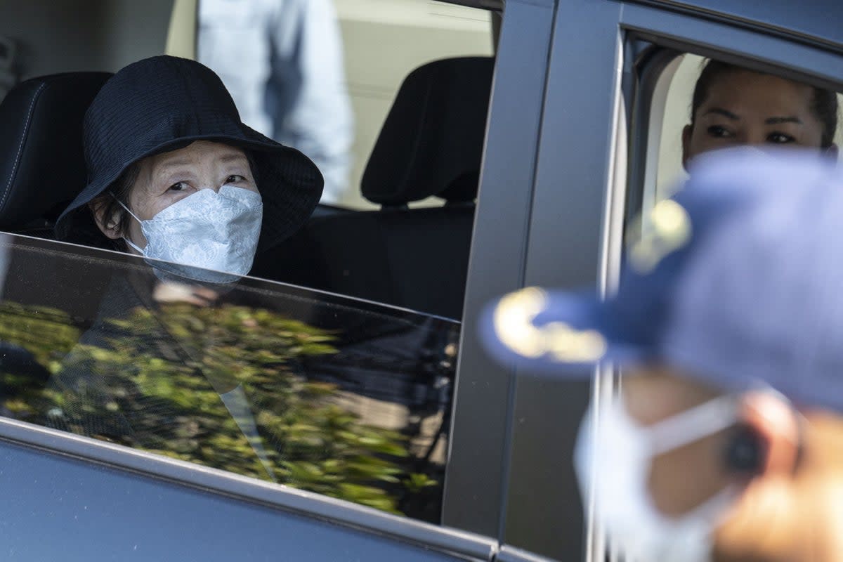 Japanese Red Army founder Fusako Shigenobu (left) is pictured at the moment of her release from jail in Tokyo on 28 May 2022 (AFP via Getty Images)