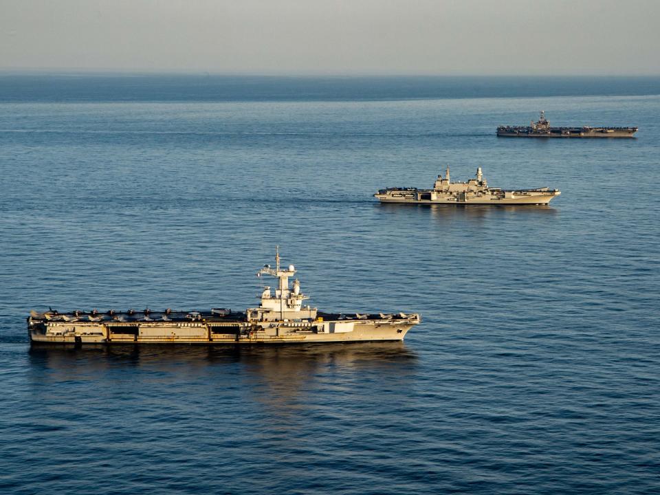 From right to left, Nimitz-class aircraft carrier USS Harry S. Truman (CVN 75), the Italian aircraft carrier ITS Cavour (C 550) and the French aircraft carrier Charles de Gaulle (R 91) transit the Mediterranean Sea in formation, Feb. 6, 2022.