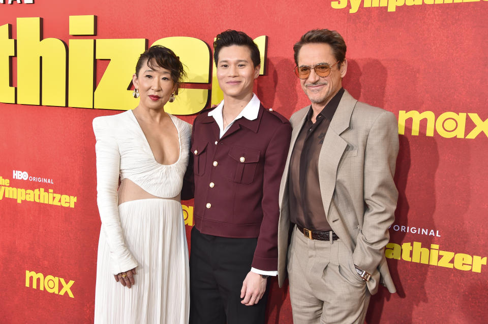 Sandra Oh, Hoa Xuande and Robert Downey Jr.