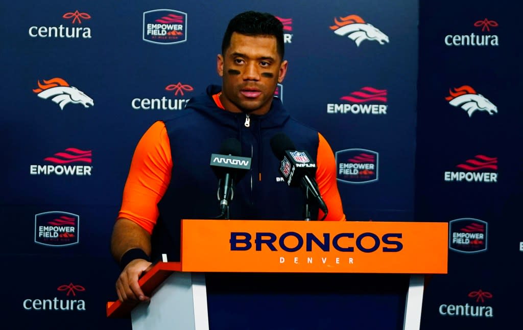 Denver Broncos quarterback Russell Wilson speaks during a news conference after an NFL football game at Empower Field at Mile High, Sunday, Dec. 24, 2023, in Denver. (AP Photo/David Zalubowski)