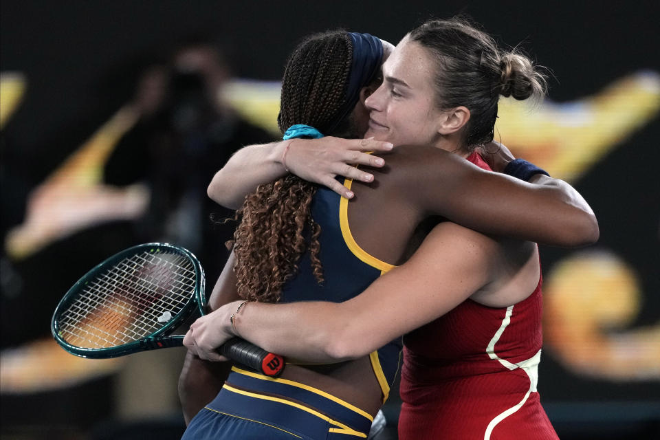 Aryna Sabalenka, right, of Belarus is congratulated by Coco Gauff of the U.S. following their semifinal match at the Australian Open tennis championships at Melbourne Park, Melbourne, Australia, Thursday, Jan. 25, 2024. (AP Photo/Alessandra Tarantino)