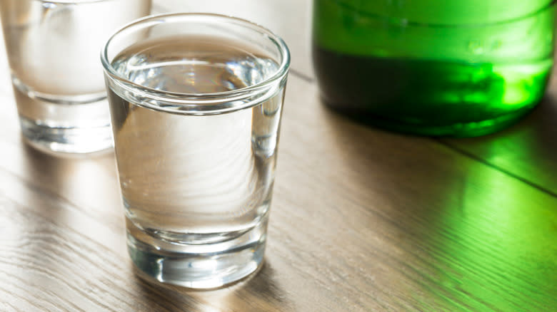 clear liqueur in shot glass