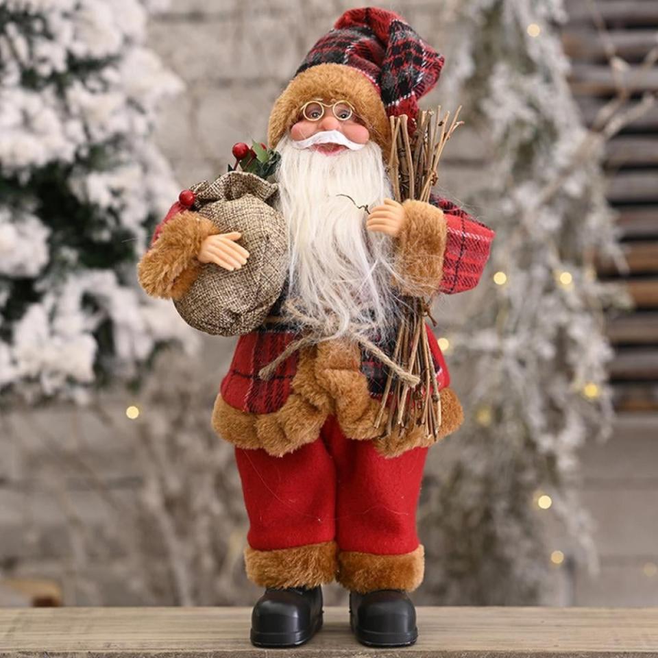 <p><a href="https://go.redirectingat.com?id=74968X1596630&url=https%3A%2F%2Fwww.walmart.com%2Fip%2F12-Inch-Santa-Claus-Figurines-Decoration-Standing-Doll-Table-Top-Christmas-Ornament-Xmas-Indoor-Chef-Figure-Collection-Decor-Animated-Santas-Statue-G%2F1250765647&sref=https%3A%2F%2Fwww.thepioneerwoman.com%2Fholidays-celebrations%2Fg45211938%2Fwalmart-christmas-decorations%2F" rel="nofollow noopener" target="_blank" data-ylk="slk:Shop Now;elm:context_link;itc:0;sec:content-canvas" class="link ">Shop Now</a></p><p>12-Inch Santa Claus Figurine</p><p>walmart.com</p><p>$13.77</p><span class="copyright">Walmart</span>