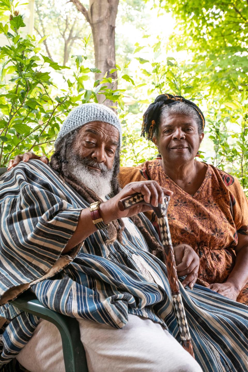 Verge “Brother Sage” Gillam and Charlotte Pfeifer pose for a portrait on their porch in South Bend on Wednesday, June 7, 2023.