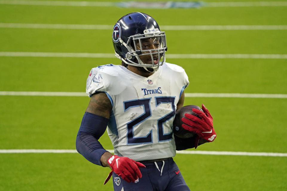 Tennessee Titans running back Derrick Henry (22) rushes for a touchdown against the Houston Texans during the second half of an NFL football game Sunday, Jan. 3, 2021, in Houston. (AP Photo/Sam Craft)