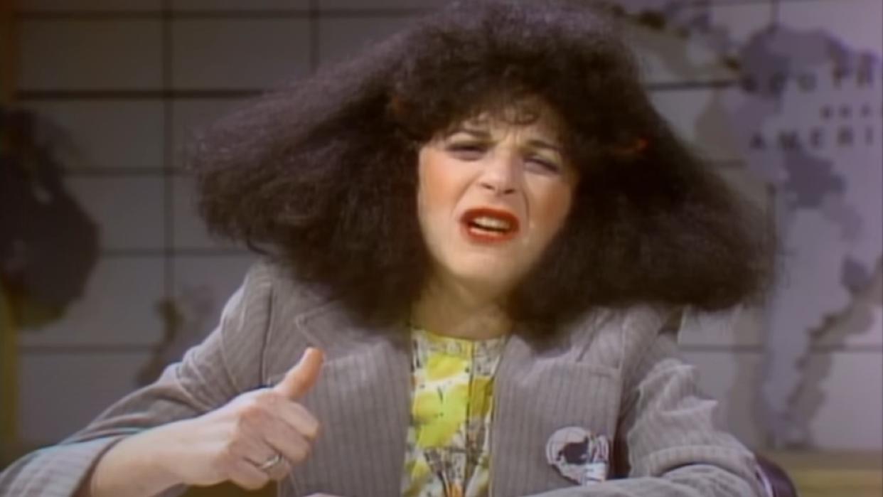  Gilda Radner as Roseanne Roseannadanna on Weekend Update. 