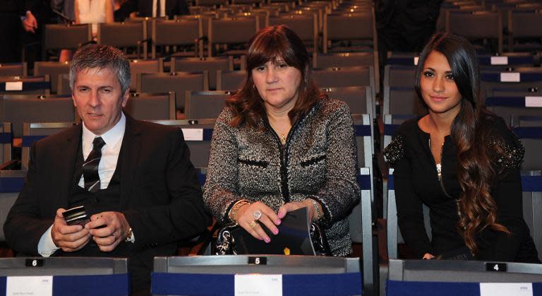 Lionel Messi's parents, Jorge (L), Celia Maria Cuccitini (C) and girlfriend Antonella Roccuzzo pictured in Zurich on January 9, 2012