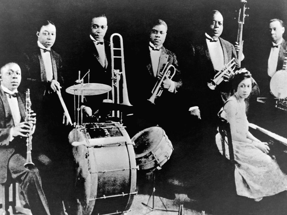 King Oliver's Creole Jazz Band. Lil Hardin, Louis Armstrong's wife, played piano for the band.
