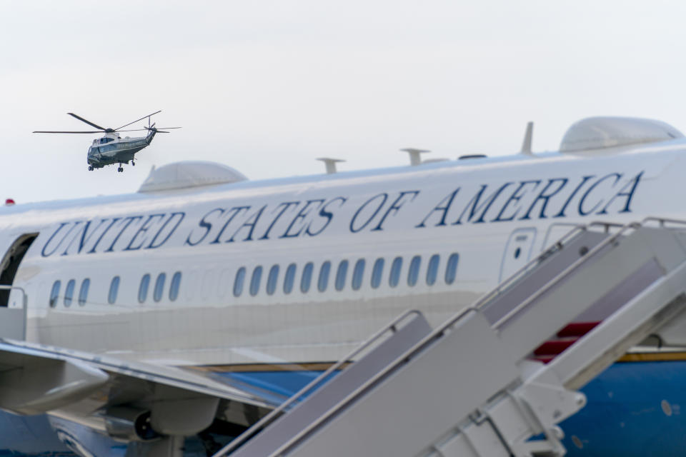 Air Force Two is visible in the foreground as a Marine helicopter with Vice President Mike Pence aboard departs Andrews Air Force Base, Md., Monday, Aug. 24, 2020, after Pence spoke at the 2020 Republican National Convention in Charlotte, N.C. (AP Photo/Andrew Harnik)