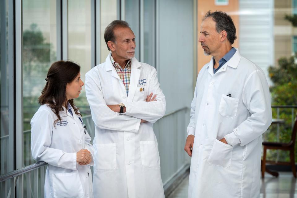 Dr. Scott Barman, second from left, and Dr. David Fulton, pictured with graduate student Zsuzsanna Bordan at the Augusta University Health Sciences campus in October, are researching pulmonary arterial hypertension and its many correlations to cancer.