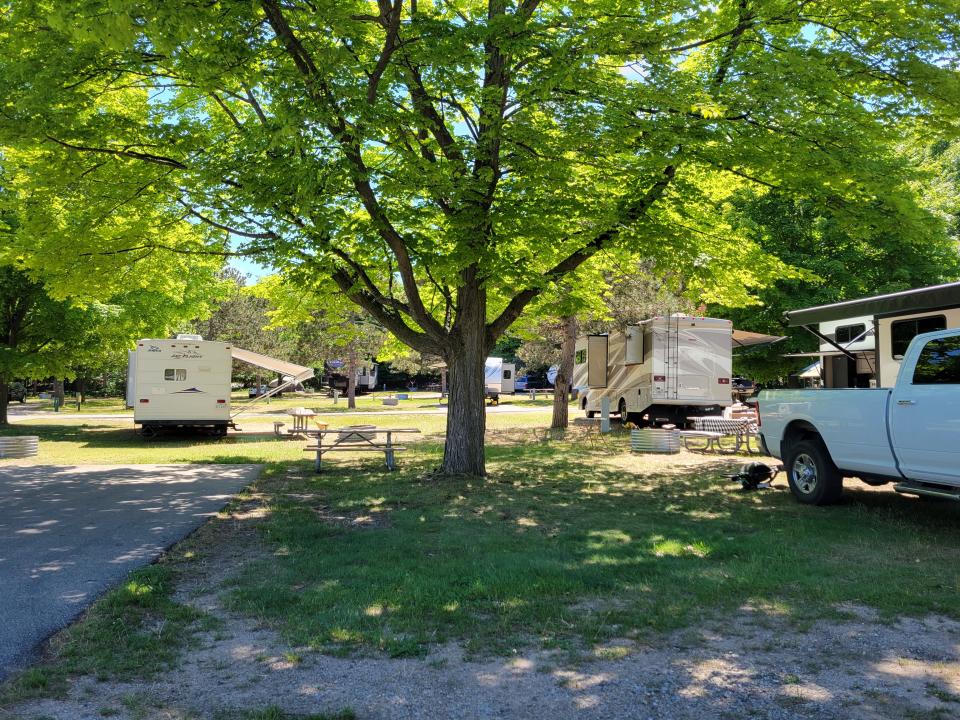 At Lake Macatawa Campground, families can enjoy two play structures, a volleyball court and a horseshoe area, plus a small beach on Lake Macatawa across from the campground's entrance.