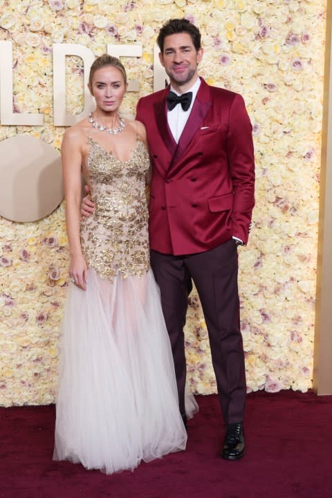 Emily Blunt, left, and John Krasinski arrive at the 81st Golden Globe Awards on Sunday, Jan. 7, 2024, at the Beverly Hilton in Beverly Hills, Calif. (Photo by Jordan Strauss/Invision/AP)
