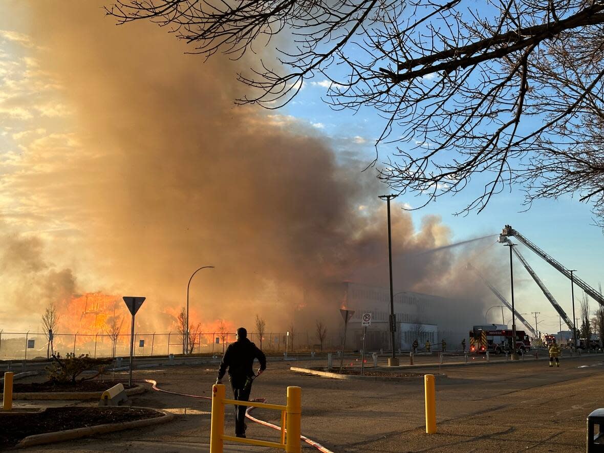 Hangar 11, located on the Blatchford development in Edmonton, was the site of a large fire Monday night. The World War II-era structure was one of the last surviving buildings of its kind. (Mrinali Anchan/CBC - image credit)