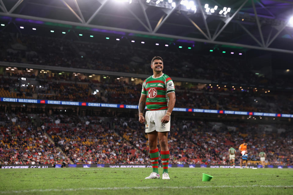 Latrell Mitchell smiles after kicking a conversion.