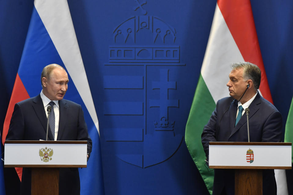 Hungarian Prime Minister Viktor Orban, right, and Russian President Vladimir Putin hold a joint press conference following their talks at the PM's office in the Castle of Buda in Budapest, Hungary, Wednesday, Oct. 30, 2019. (Zoltan Mathe/MTI via AP)