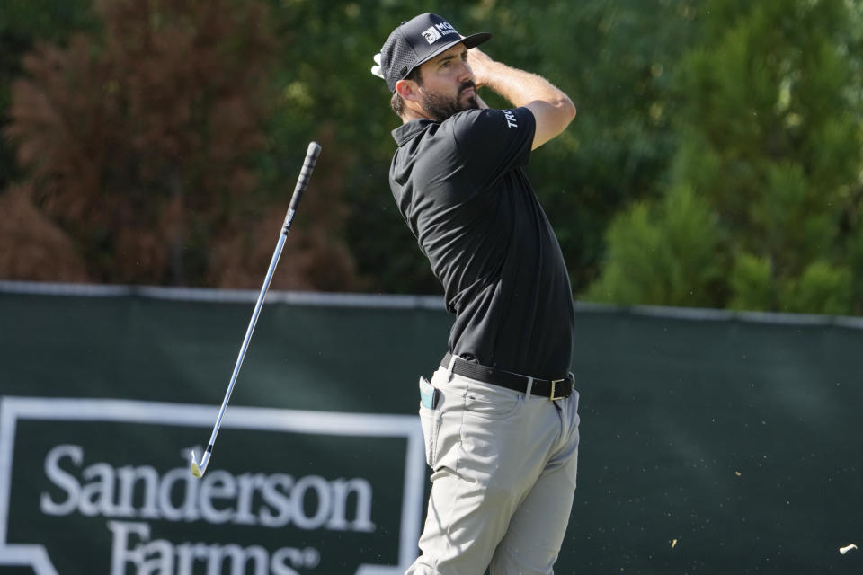 Mark Hubbard drops his golf club after hitting his drive from the 10th tee box during the second day of play at the Sanderson Farms Championship golf tournament in Jackson, Miss., Friday, Oct. 6, 2023. (AP Photo Rogelio V. Solis)