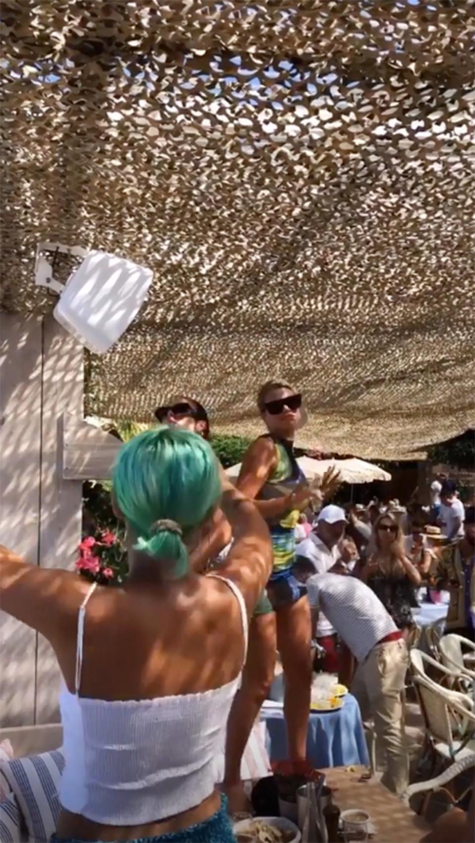 Kylie captured a video of her pals getting the party started at lunch! 