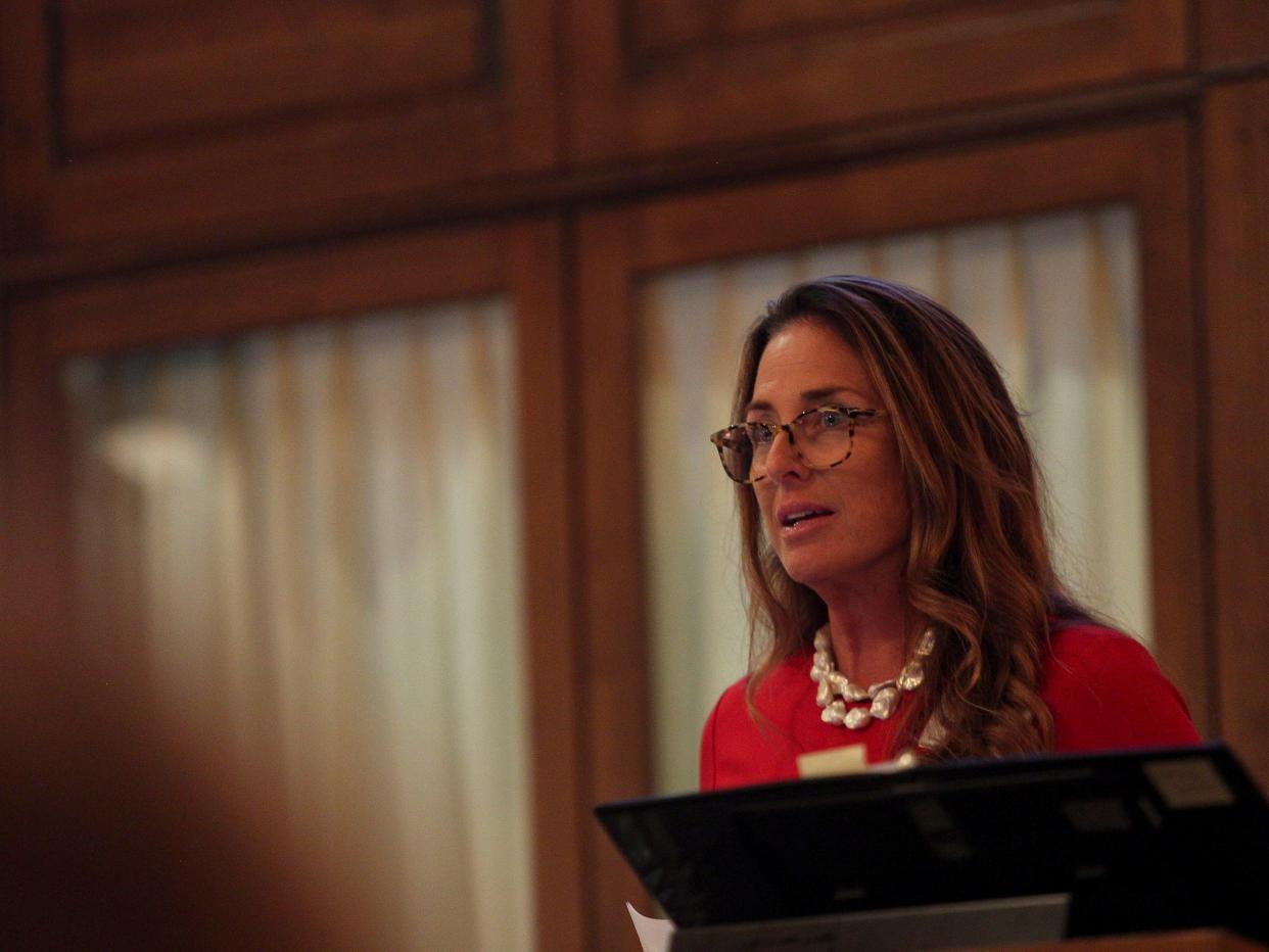 Tamara Karu, the national director of strategic philanthropy for Magen David Adom, an Israeli first response organization providing medical emergency, disaster, ambulance and blood service, speaks Monday during a night of vigil at Temple Beth Shalom in Vero Beach.