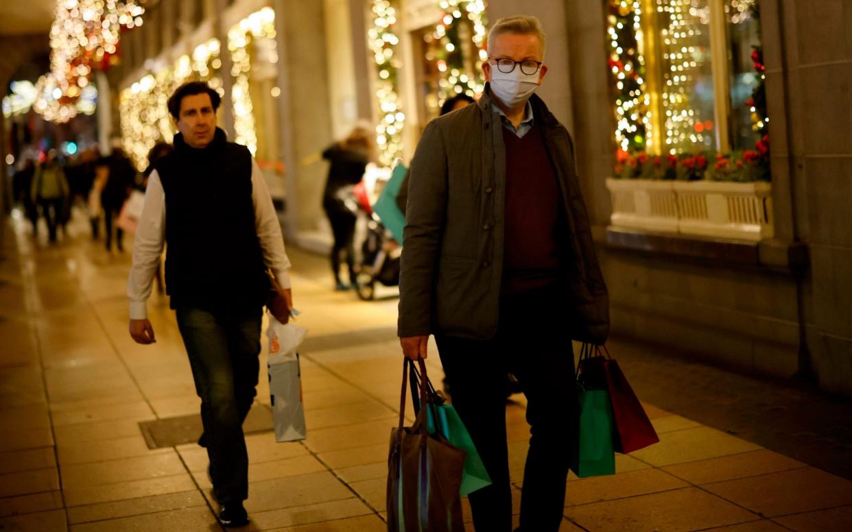 Michael Gove out Christmas shopping on Saturday - TOLGA AKMEN/AFP via Getty Images