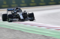 Mercedes driver Lewis Hamilton of Britain steers his car during a practice session prior to the Formula One Grand Prix at the Barcelona Catalunya racetrack in Montmelo, Spain, Friday, Aug. 14, 2020. (Josep Lago, Pool via AP)