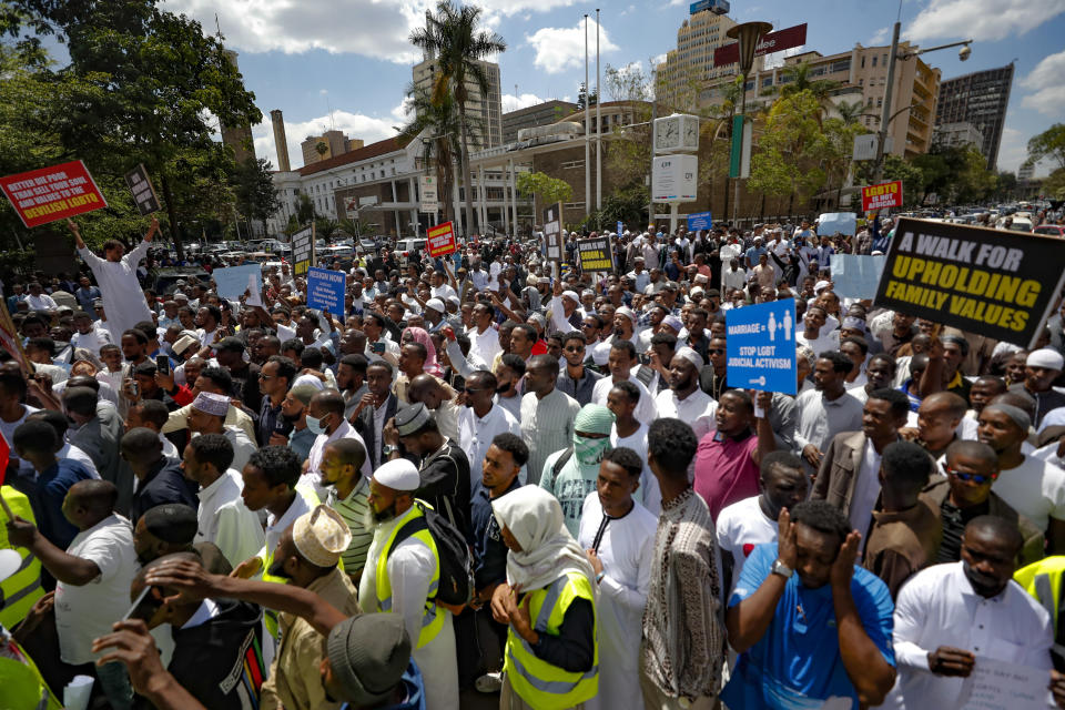 People hold placards as they chant slogan during a protest against a ruling by the Kenya supreme court for upholding the National Gay and Lesbian Human Rights Commission (NGLHRC) to register the association in Nairobi, Friday Oct. 6 2023. The protests took place after the Friday prayers with demonstrator’s calling out Kenya’s highest court for “condoning immorality.” (AP Photo/Brian Inganga)