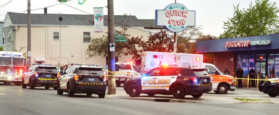 In this file photo, Erie police and firefighters, along with EmergyCare paramedics, respond to a reported shooting inside the Quick Stop at West 18th and Chestnut streets in Erie on May 16, 2023.