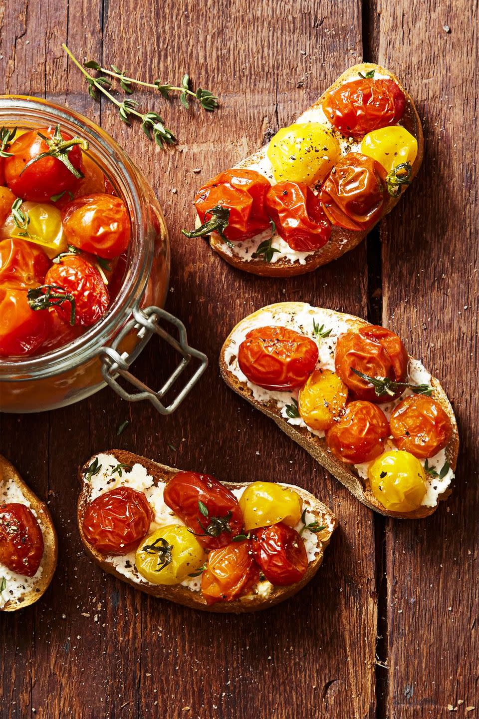 <p>This 4-ingredient confit will dress up any appetizer spread. Add a spoonful to crusty bread for the most elegant (and easiest) bruschetta ever.</p><p>Get the <strong><a href="https://www.goodhousekeeping.com/food-recipes/a45216/cherry-tomato-confit-recipe/" rel="nofollow noopener" target="_blank" data-ylk="slk:Cherry Tomato Confit recipe;elm:context_link;itc:0;sec:content-canvas" class="link ">Cherry Tomato Confit recipe</a></strong>.</p>