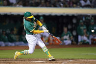 Oakland Athletics' Cristian Pache hits a single against the Los Angeles Angels during the fifth inning of a baseball game in Oakland, Calif., Tuesday, Oct. 4, 2022. (AP Photo/Godofredo A. Vásquez)