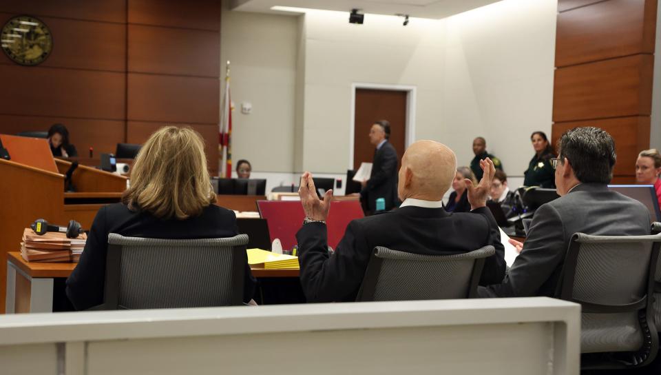Assistant State Attorney Mike Satz raises his hands while speaking to the court after the defense announced their intention to rest their case during the penalty phase of the trial of Marjory Stoneman Douglas High School shooter Nikolas Cruz at the Broward County Courthouse in Fort Lauderdale on Wednesday, Sept. 14, 2022. Cruz previously plead guilty to all 17 counts of premeditated murder and 17 counts of attempted murder in the 2018 shootings. (Amy Beth Bennett/South Florida Sun Sentinel via AP, Pool)