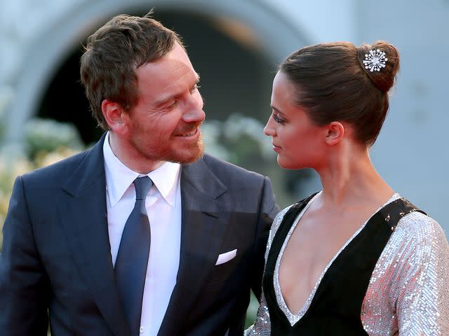 <p>Franco Origlia/Getty</p> Michael Fassbender and Alicia Vikander attend the premiere of 'The Light Between Oceans' during the 73rd Venice Film Festival in September 2016 in Venice, Italy.