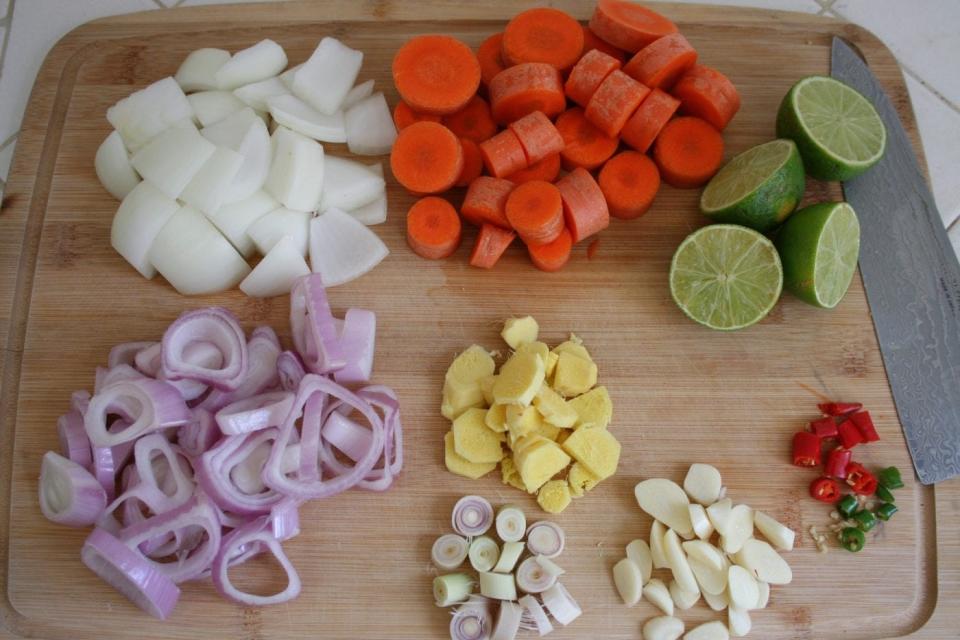 Chopped vegetable ingredients for Instant Pot pumpkin soup.