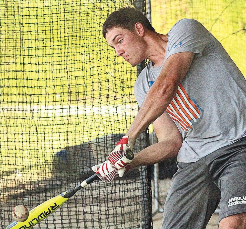 Caney Valley High's Daniel Barham connects with the ball during tryouts a few years ago for the Bartlesville Doenges Ford Indians' summer baseball team.