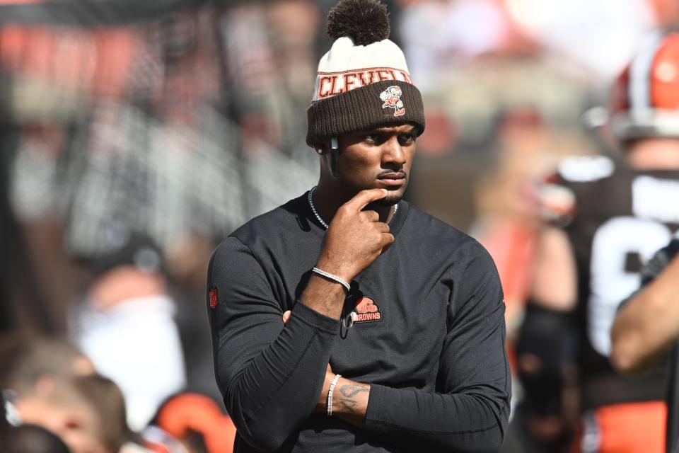 Cleveland Browns quarterback Deshaun Watson (4) watches from the sidelines during the first half against the Baltimore Ravens on Oct. 1 in Cleveland.