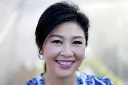 FILE PHOTO - Ousted former Thai PM Yingluck Shinawatra poses for a portrait while receiving foreign media at her vegetables garden at her house in Bangkok, Thailand, February 12, 2016. REUTERS/Jorge Silva/File Photo