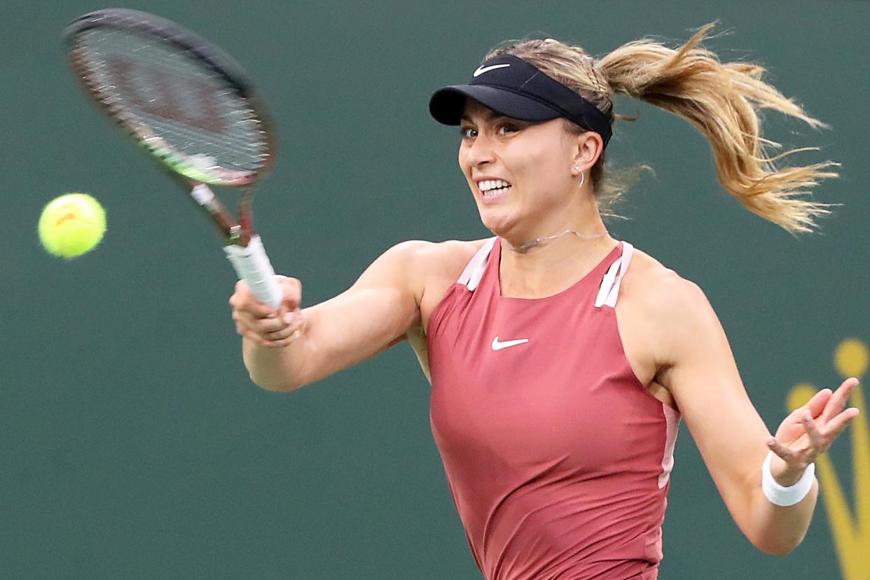 Paula Badosa of Spain hits a return to Leylah Fernandez of Canada during the BNP Paribas Open in Indian Wells, Calif., on Tuesday, March 15, 2022. 