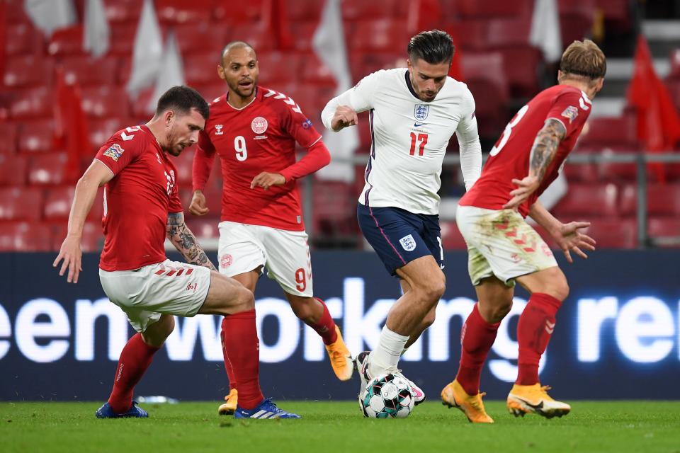 Jack Grealish dribbles at the Denmark defence (Getty Images)