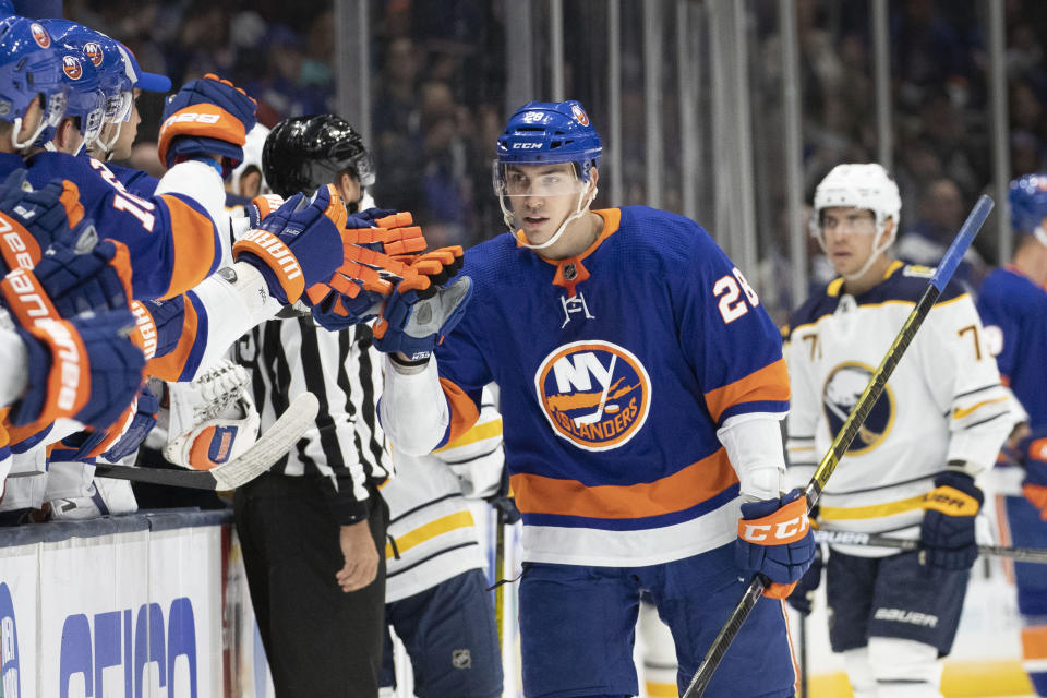 New York Islanders left wing Michael Dal Colle (28) celebrates his first period goal during an NHL hockey game against the Buffalo Sabres, Saturday, Dec. 14, 2019 in Uniondale, N.Y. (AP Photo/Mark Lennihan)