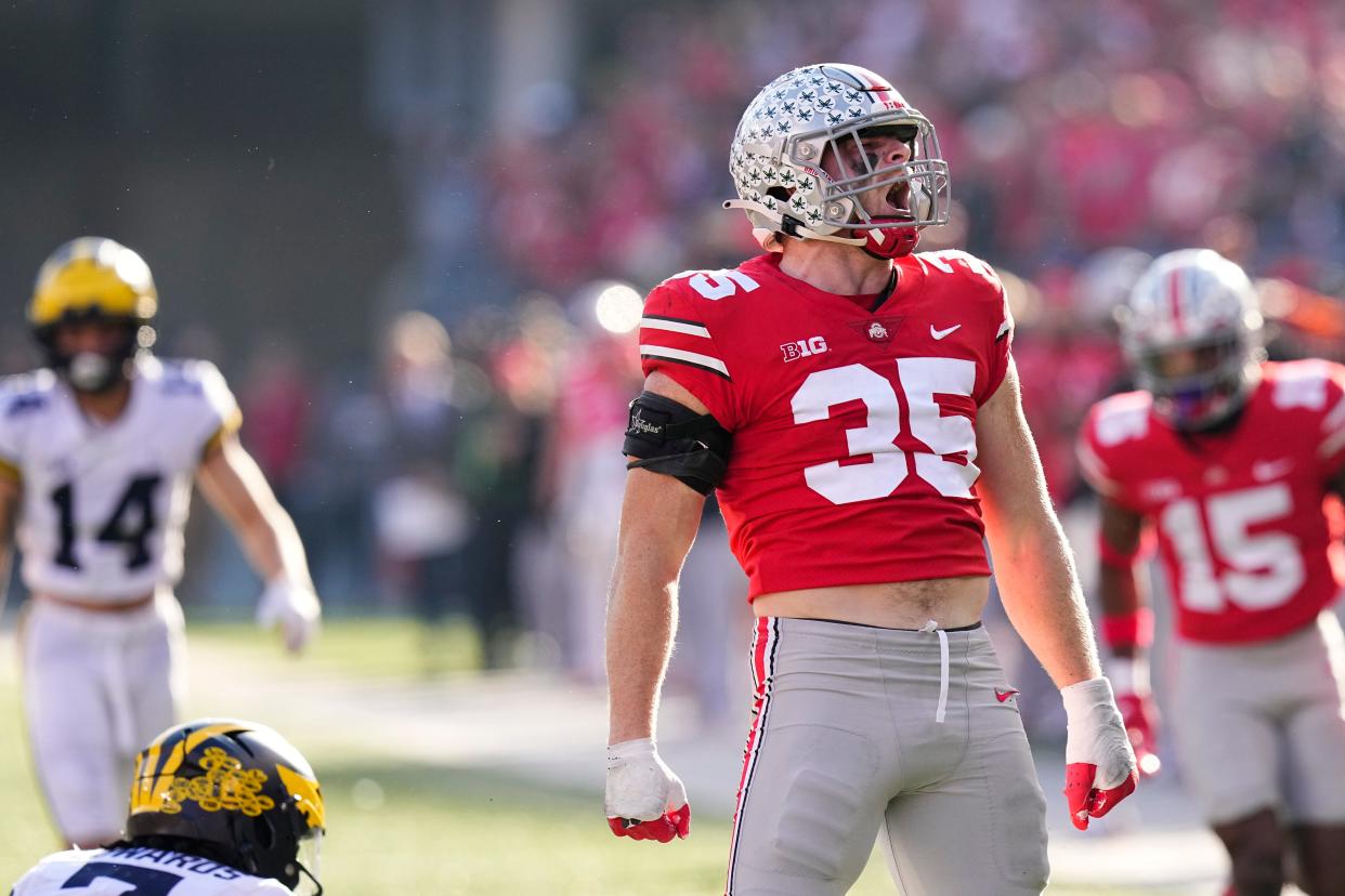 Nov 26, 2022; Columbus, Ohio, USA;  Ohio State Buckeyes linebacker Tommy Eichenberg (35) celebrates a tackle during the second half of the NCAA football game against the Michigan Wolverines at Ohio Stadium. Mandatory Credit: Adam Cairns-The Columbus Dispatch