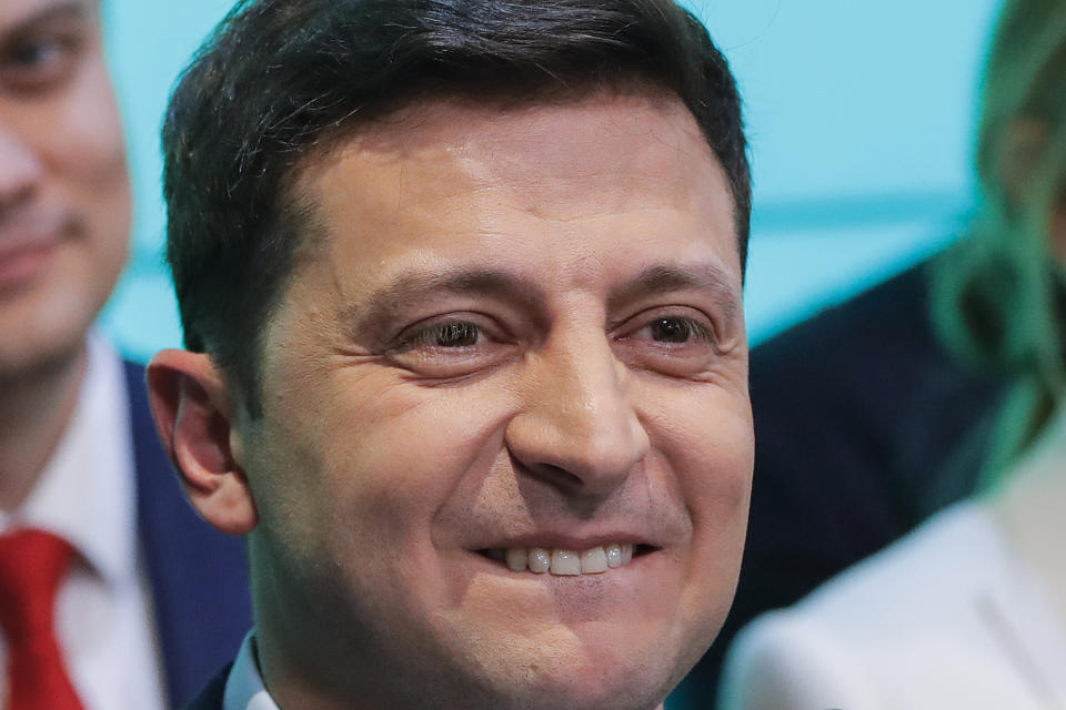 Ukrainian comedian and presidential candidate Volodymyr Zelenskiy smiles after the second round of presidential elections in Kiev, Ukraine, Sunday, April 21, 2019. Ukrainians voted on Sunday in a presidential runoff as the nation's incumbent leader struggles to fend off a strong challenge by a comedian who denounces corruption and plays the role of president in a TV sitcom. (AP Photo/Vadim Ghirda)