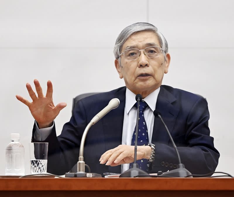 Bank of Japan Governor Haruhiko Kuroda arrives at its headquarters to attend the second day of a two-day Monetary Policy Meeting in Tokyo