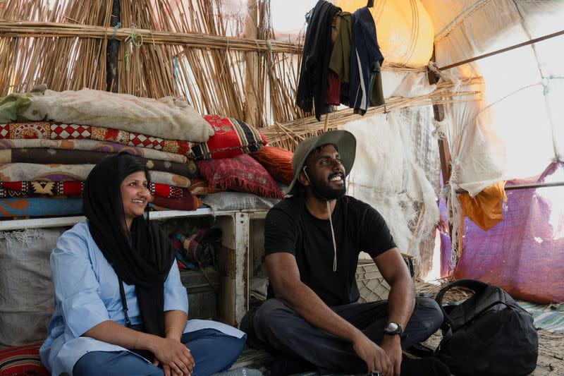 Lorin and Galton Lenie, French tourists of Sri Lankan descent, during a tour the marshes, in Nassiriya