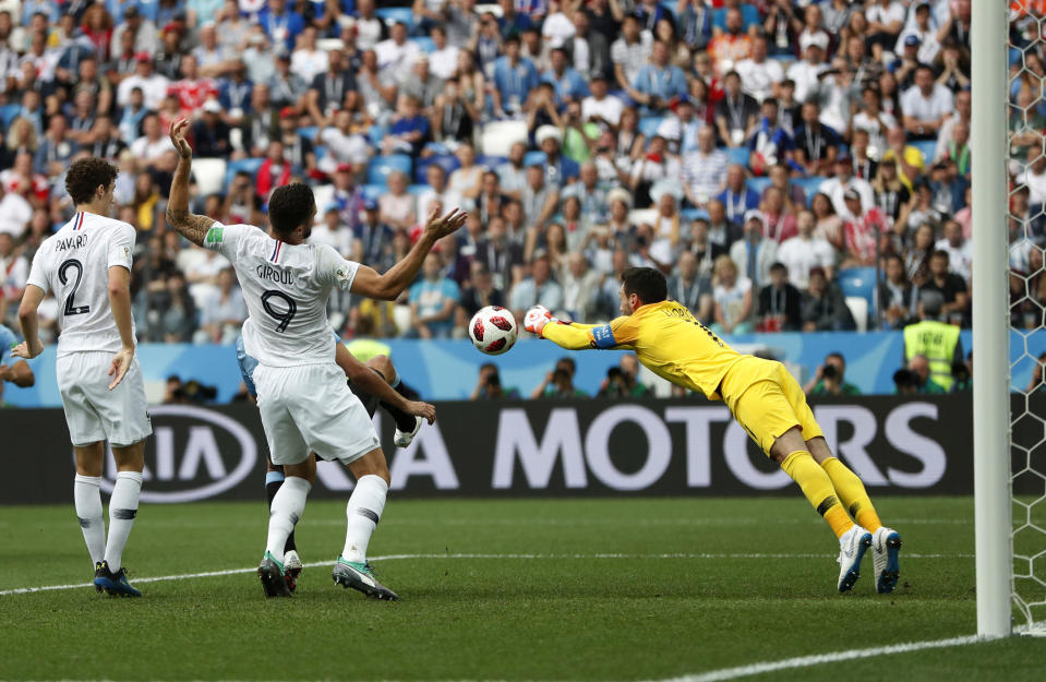 France goalkeeper Hugo Lloris lunges for a ball during the quarterfinal match between Uruguay and France at the 2018 soccer World Cup in the Nizhny Novgorod Stadium, in Nizhny Novgorod, Russia, Friday, July 6, 2018. (AP Photo/Natacha Pisarenko)