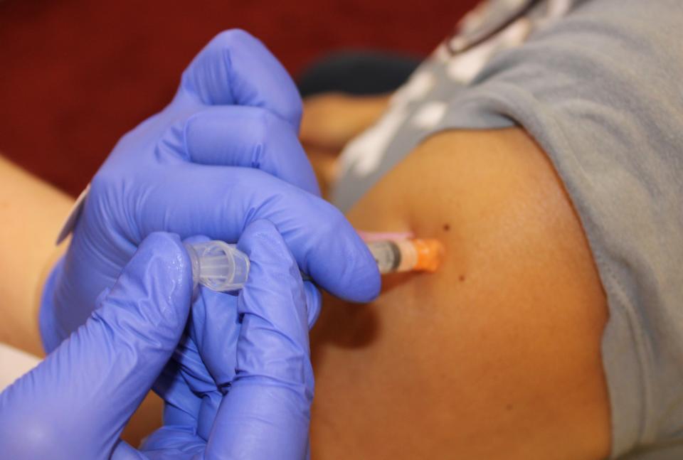 A Johnson & Johnson Janssen single-dose COVID-19 vaccine is administered at the vaccination clinic at the Tabernacle Community Life Center in the Crater Health District on Thursday, March 11.