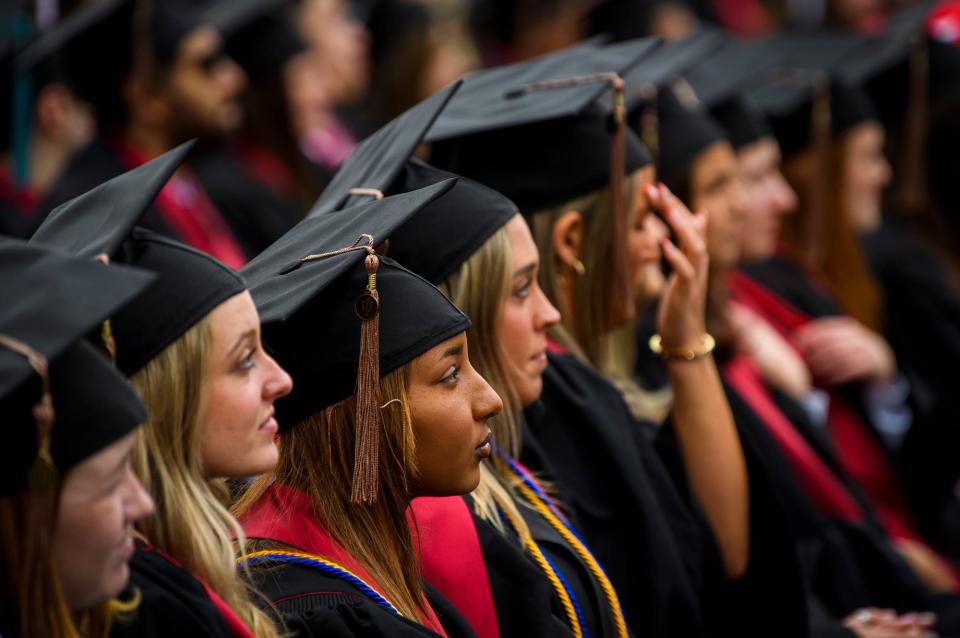 Graduates listen inside Memorial Stadium during Indiana University's 193rd undergraduate commencement ceremony on Saturday, May 7, 2022.